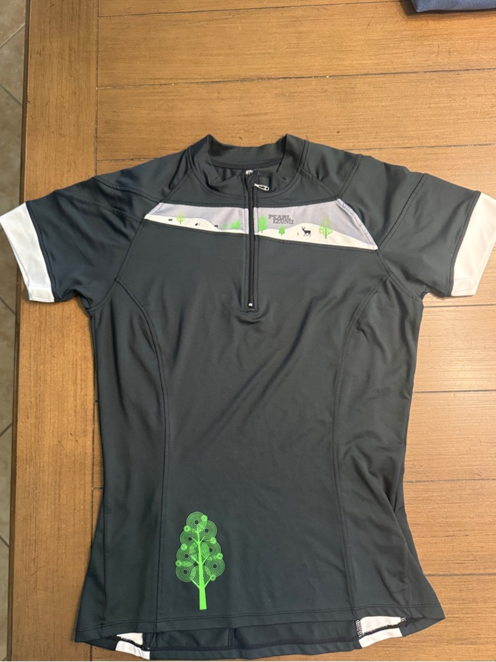 Pearl Izumi Black Short Sleeve Cycling Jersey with White Sleeves and Green Tree